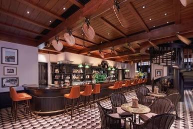 Interior of Long Bar at Raffles Hotel Singapore
