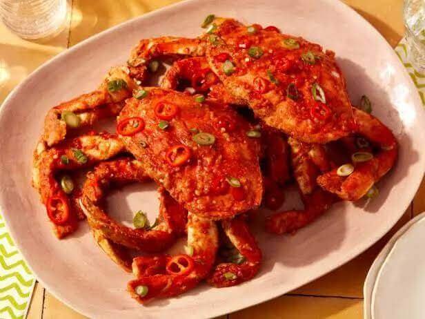 Platter of Singaporean Chili Crab served with sauce