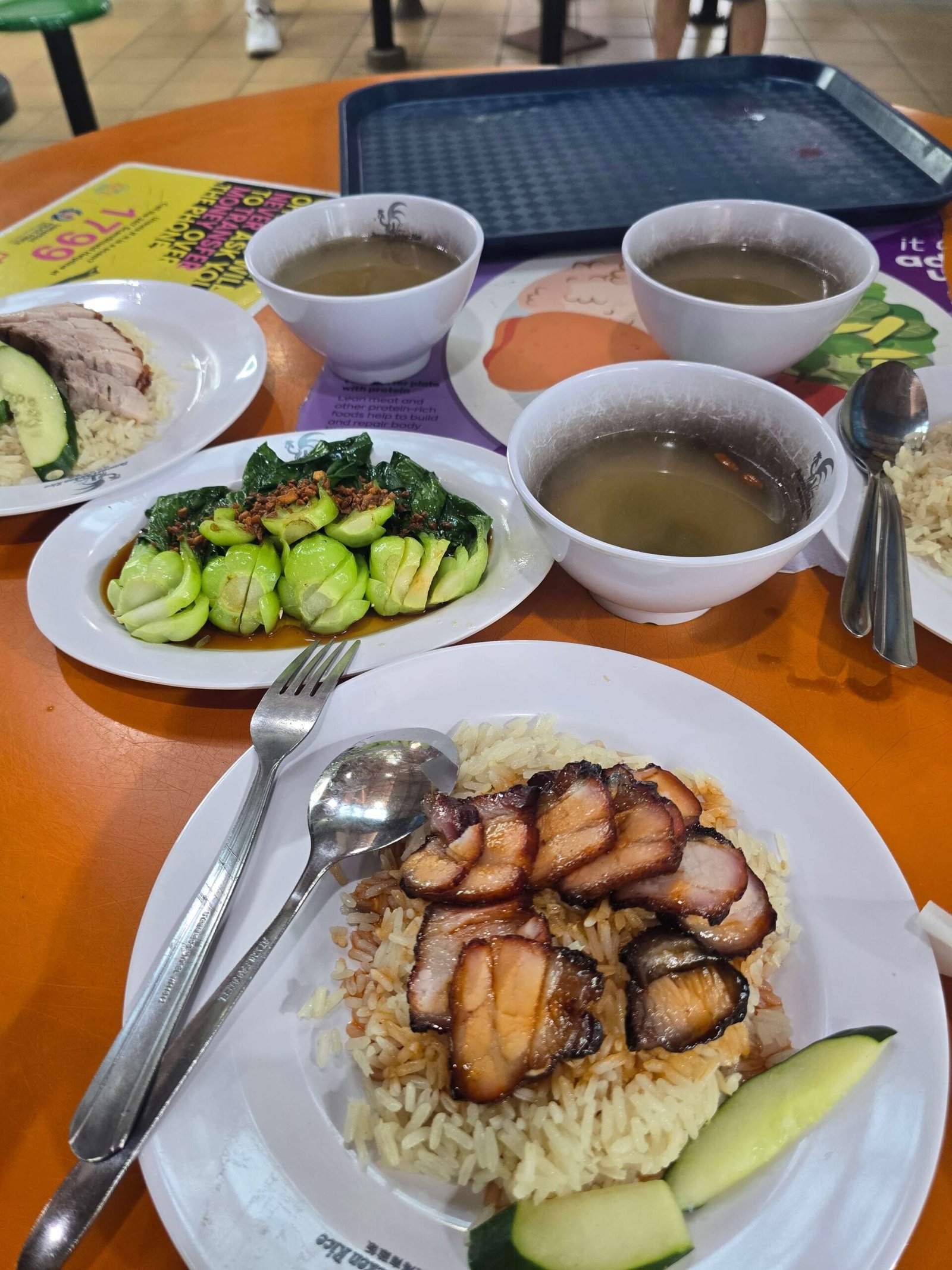 A variety of traditional dish options at a Singapore hawker center
